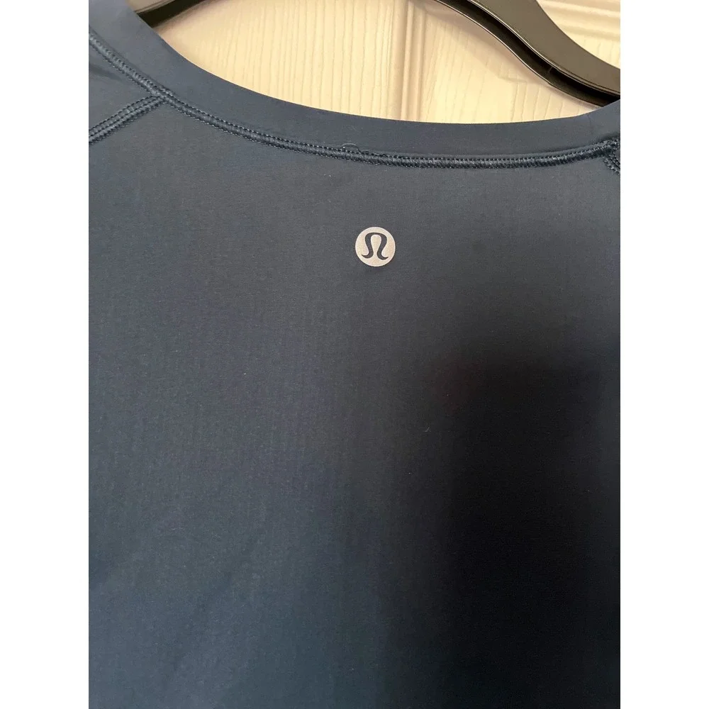 Lululemon Teal Short Sleeve Mesh Hem Crossover Tulip Back Activewear Top Womens